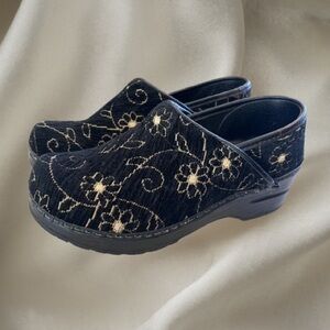 Dansko Black Floral Women's Clogs